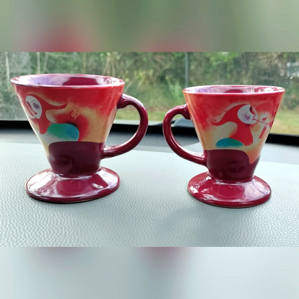 Two 1999 Linda Frichtel cups